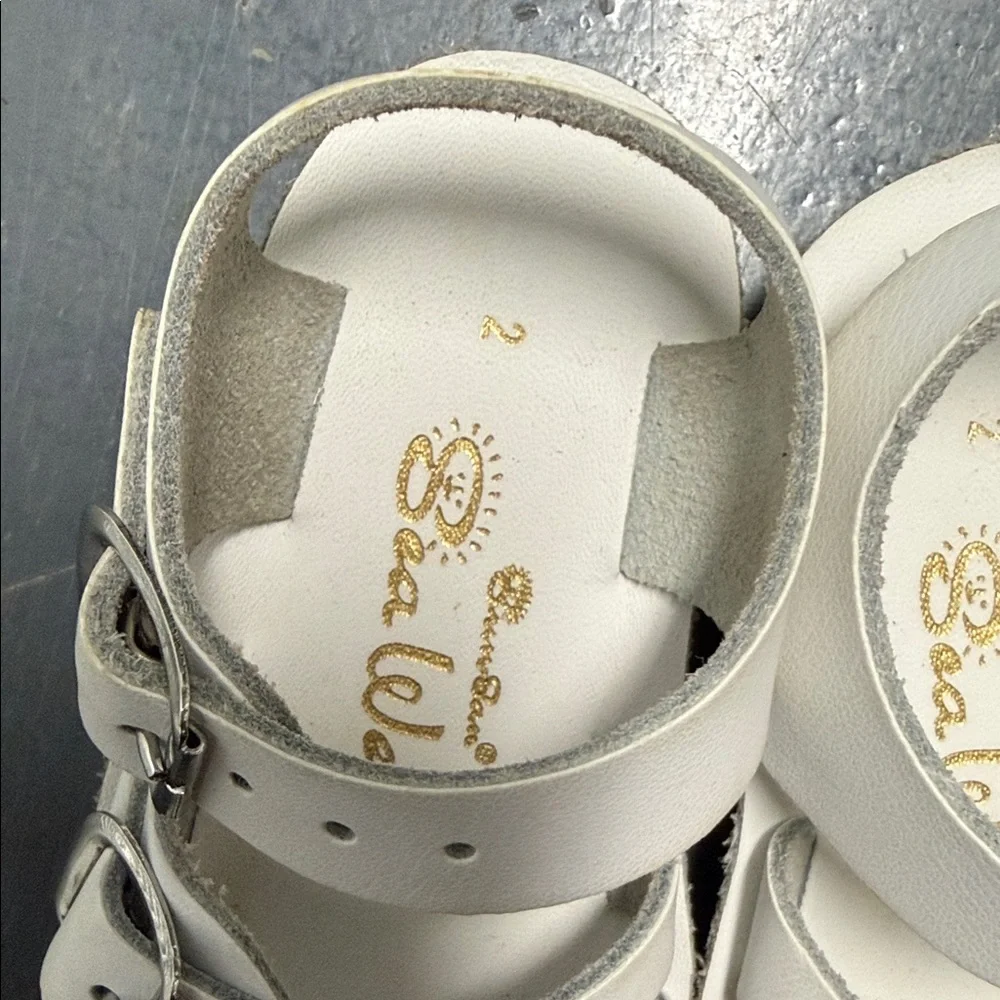 White sun San sandals